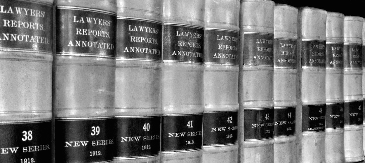 Law books on shelf representing legal expertise